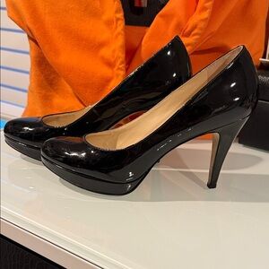 Enzo Angiolini black patten platform heels